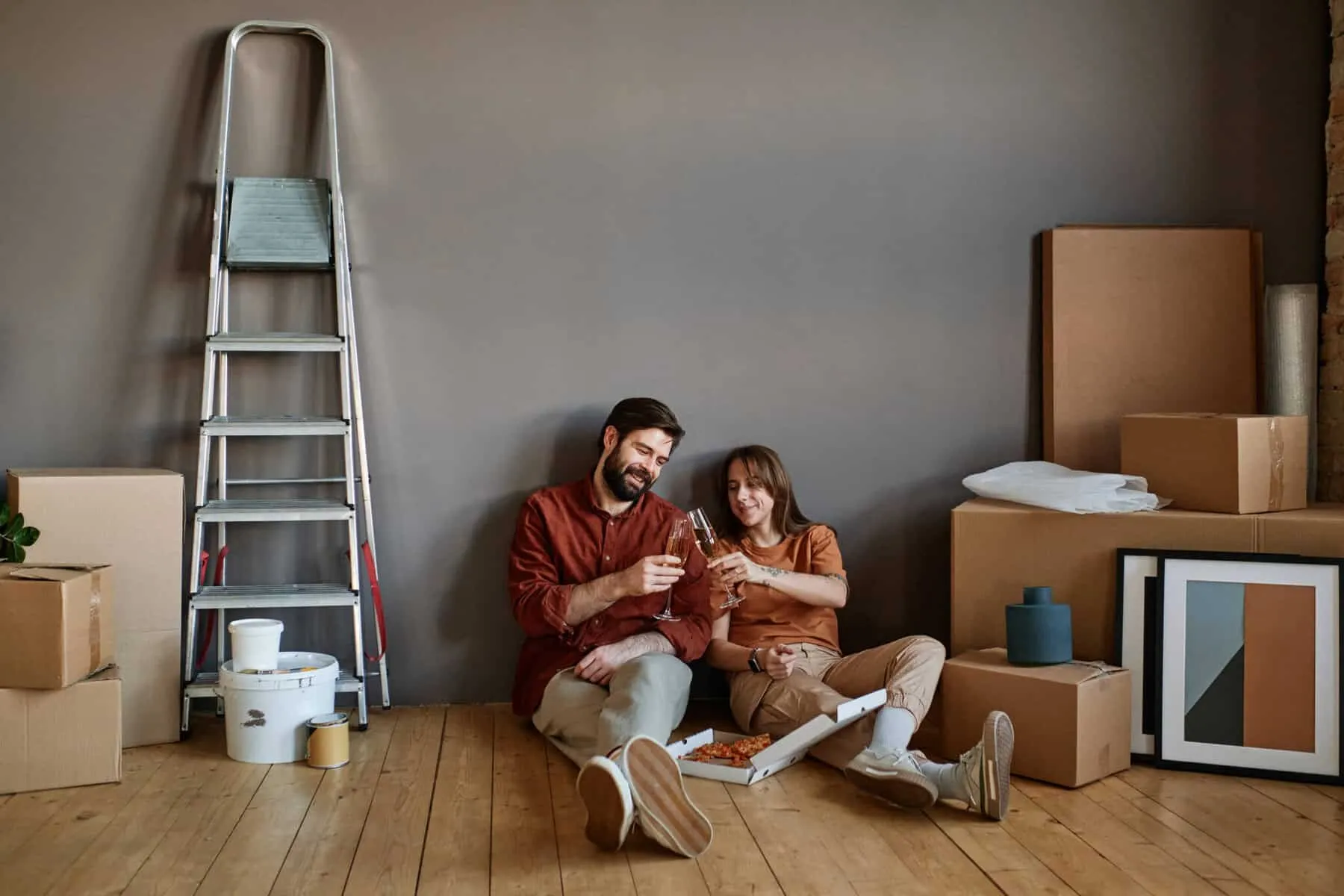 couple-celebrating-moving-to-house